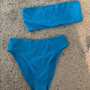 Frankie’s bikinis size Medium for top and bottom. I’m new condition.